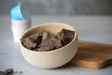 cocoa beans grated for chocolate are on the table