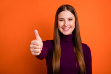 Blurred photo of positive girl enjoy ideal perfect advert promotion show thumbup symbol wear violet jumper isolated over bright shine color background