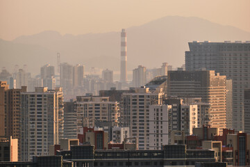 Fototapeta na wymiar Overview of city buildings in sunset