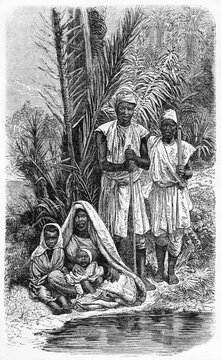 gardeners family on a shore with palms in Tripoli, Libya. Ancient grey tone etching style art by Hadamard, Le Tour du Monde, Paris, 1861
