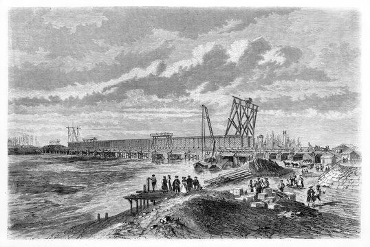 workers constructing Kehl bridge over Rhine river under a cloudy sky. Ancient grey tone etching style art by Lancelot, Le Tour du Monde, Paris, 1861