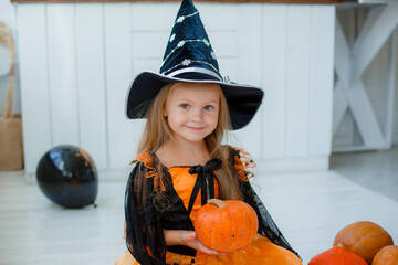 portrait of a little girl in a witch costume, Halloween