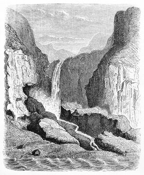 Opthun waterfalls, Norway, among rocks fronting part of shore and water. Ancient grey tone etching style art by unidentified author, Le Tour du Monde, Paris, 1861