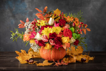 Still life with autumn harvest on wood background