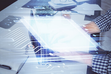 Multi exposure of tech drawings with man working on computer background. Concept of innovation.