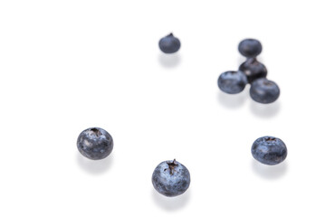 Fresh summer blueberry isolated on a white background, top view. Flat layout. Space for text