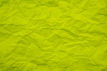 Fototapeta premium Close up of green wrinkle crumpled old with paper page texture rough background. crease grunge parchment pattern vintage design