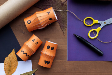 step by step instruction. Step 8 
Children's craft paper scissors glue pumpkin garland for...