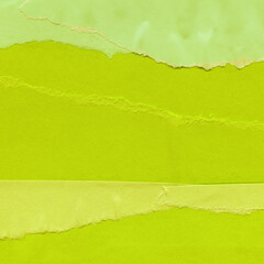 Colorful torn paper collage close-up. Texture made from various paper and cardboard parts. Damaged...