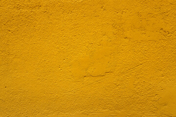 Yellow abstract concrete and cement textured background