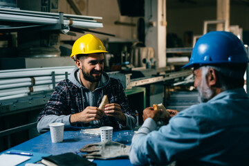 industrial workers on lunch break at the warehouse