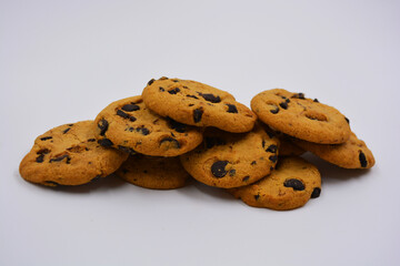 Very sweet shortbread cookie with chocolate pieces located on a white background. Ukrainian popular cookies, very satisfying with the taste of baked milk.