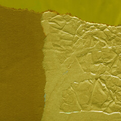 Colorful torn paper collage close-up. Texture made from various paper and cardboard parts. Damaged old paper background. Vintage blank wallpaper. Material design backdrop.