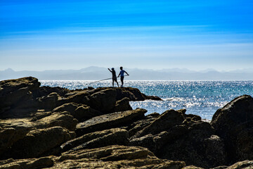 Fototapeta na wymiar Fishermen along the strait of Gibraltar, Spain