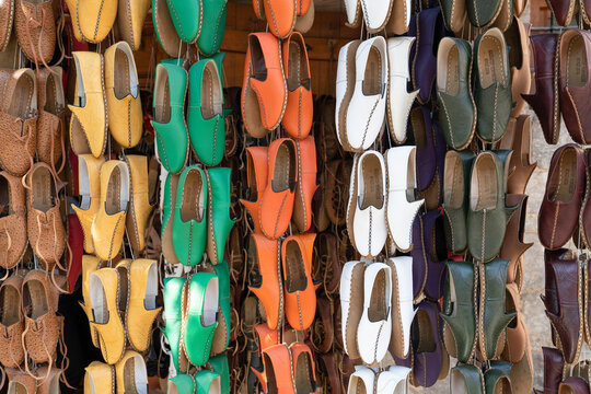Gaziantep, Turkey-September 14 2020: Traditional handmade shoe Yemeni hanging in front of the shop.