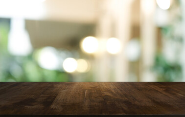 Wood Table Top in Blur Background room interior with empty copy space.