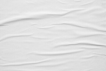 Obraz premium Blank white crumpled and creased paper poster texture background