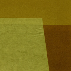Colorful torn paper collage close-up. Texture made from various paper and cardboard parts. Damaged...