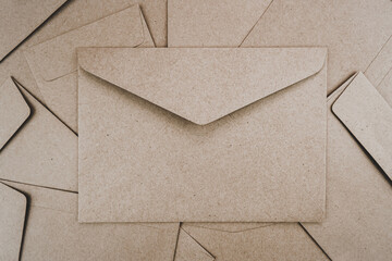 Top view of Brown paper envelope. Flat lay of Many brown paper envelopes overlaid. Stationery...