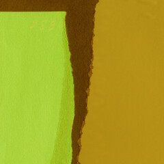 Green torn paper collage close-up. Texture made from various paper and cardboard parts. Damaged old...