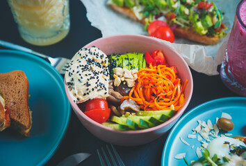 Delicious poke bowl dish served for lunch in Asian restaurant.Traditional Hawaiian cuisine dish...
