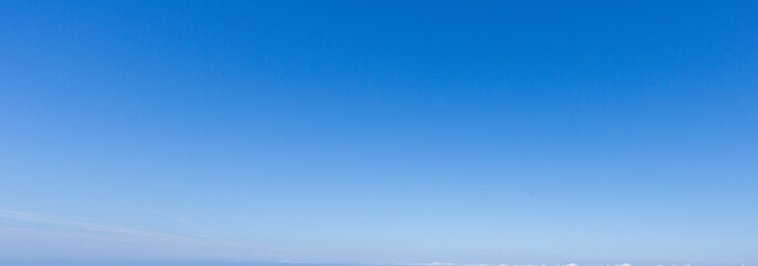 Image of a clear and cloudless sky can be used as background