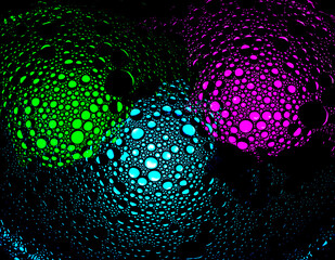 purple, magenta, teal, cyan and green droplets illuminated with colored bulb with dark background