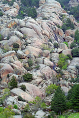 Colourful rocks and a stream in La Pedriza, Spain