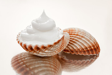 mousse, foam, soap in the sea shell, spa concept, skin care,