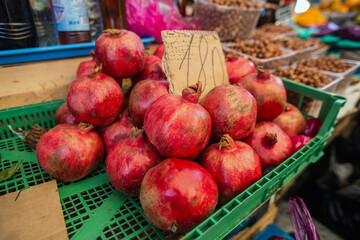 ripe pomegranates sold in the market