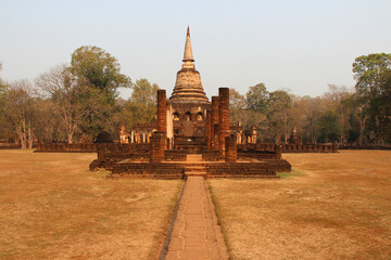 ruined buddhist temple (wat chang lom) in satchanalai-chalieng in thailand 