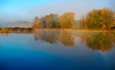 Fall morning with reflections in the water