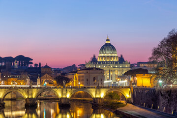Fototapeta na wymiar Twilight over the Vatican City, St Peter Basilica Rome Italy