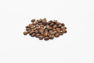 roasted coffee beans on a white background. fresh coffee. isolate