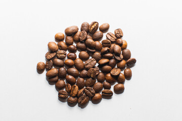 roasted coffee beans on a white background. fresh coffee. isolate