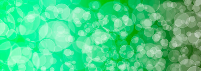 creative background from circles. soap bubbles on light. white spots on the canvas. light balloons on a green background