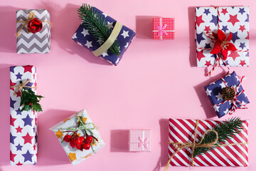 Creative frame from Christmas gift boxes with decoration.