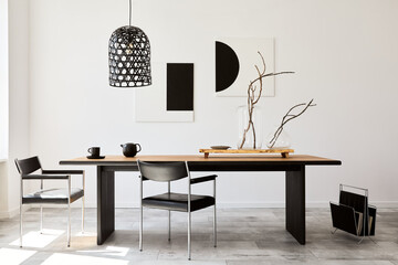 Stylish dining room interior with design wooden family table, black chairs, teapot with mug, mock...