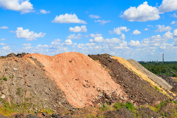 View of slag heaps of iron ore quarry. Mining industry