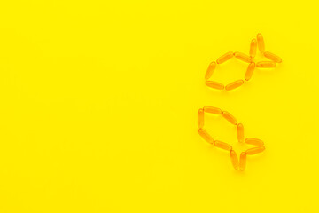 Fish oil supplement capsules and omega 3, top view