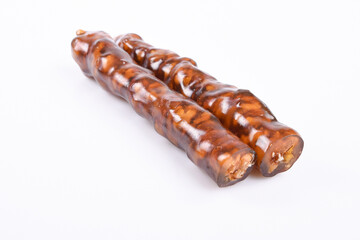 Traditional Turkish dessert; Walnut baton sausage. It is made with grape molasses and walnuts.