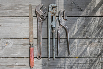 Regular plumbing tool kit, adjustable wrench, file and pliers