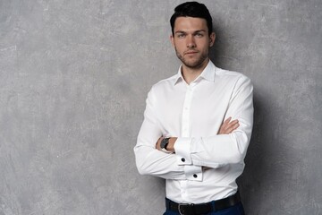 Handsome man wear blue suit isolated on grey background
