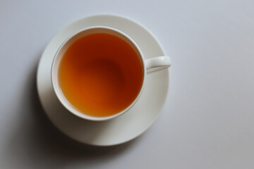 cup of tea on white background.White cup with a tea isolated on a white background.top view.
