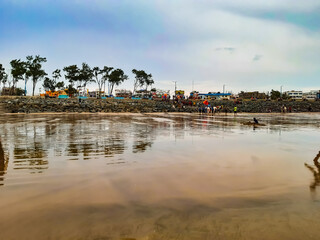 A beautiful view of the long sea in the India state of west bengal at sunset.