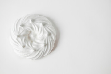 marshmallow on a white background. dessert Pavlova. Airy dessert. Minimalistic and stylish frame