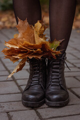legs in autumn leaves