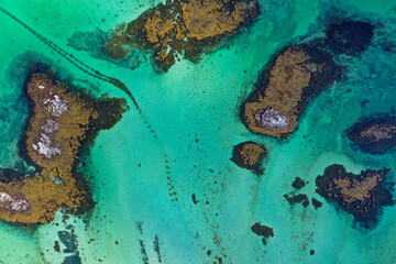 Above view of turquoise ocean and islands in Norway