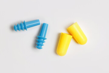 Two tipes of earplugs isolated on white