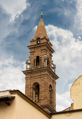 Fototapeta na wymiar Basilica di Santo Spirito (Holy Spirit, 1444-1487) in Florence downtown, Tuscany, Italy, Europe. Close-up of the bell tower (1503-1570).